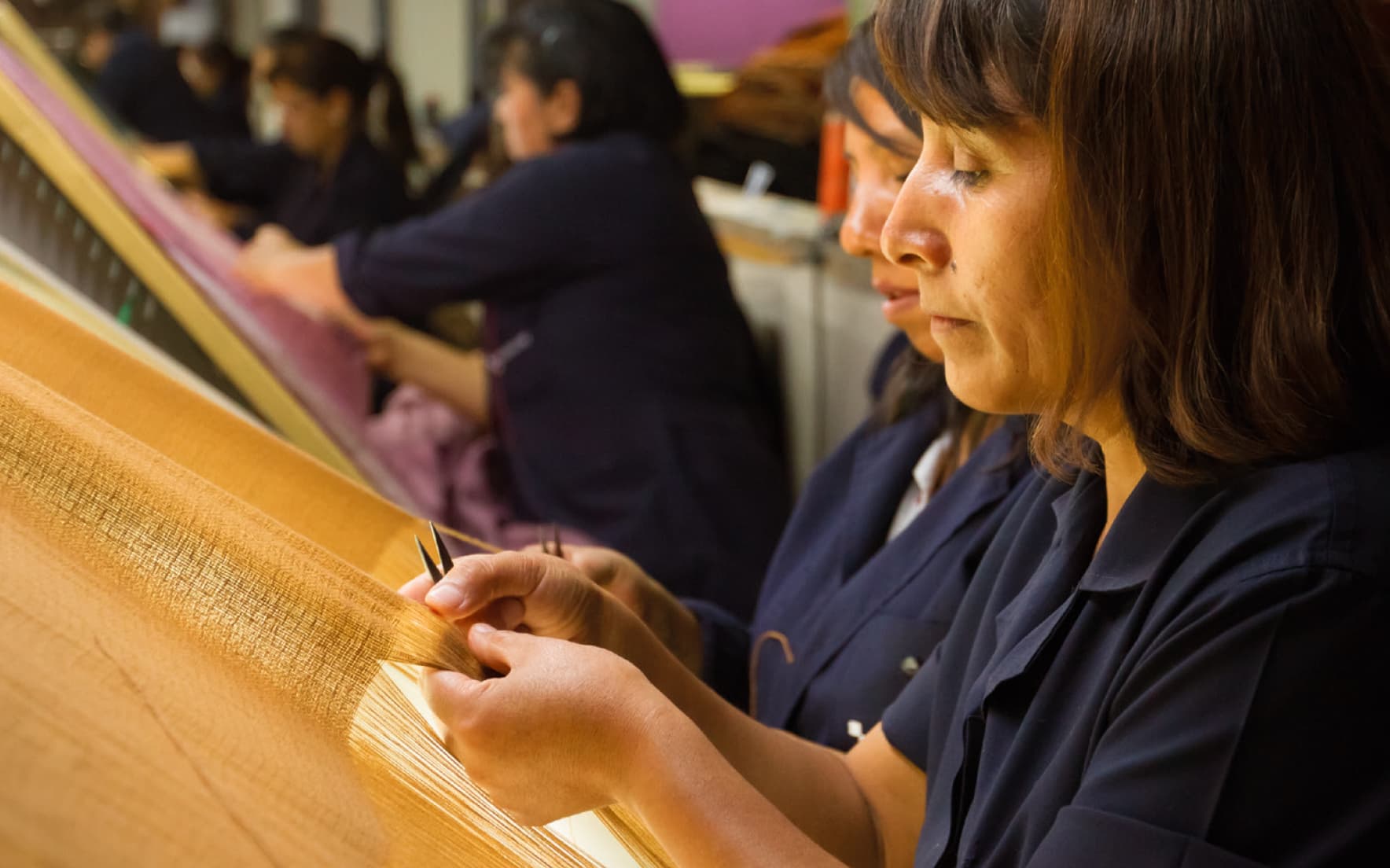 Artisan working with textiles